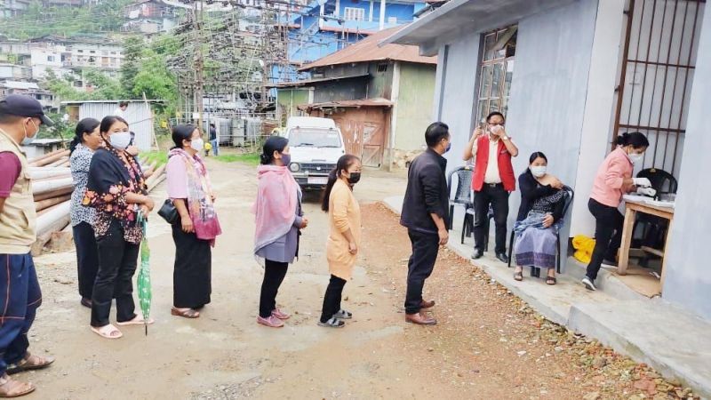 Beneficiaries stand in line during the COVID-19 vaccination underway at Alahuto colony, Zunheboto on July 18. (Photo Courtesy: IEC Bureau, CMO Office Zunheboto)